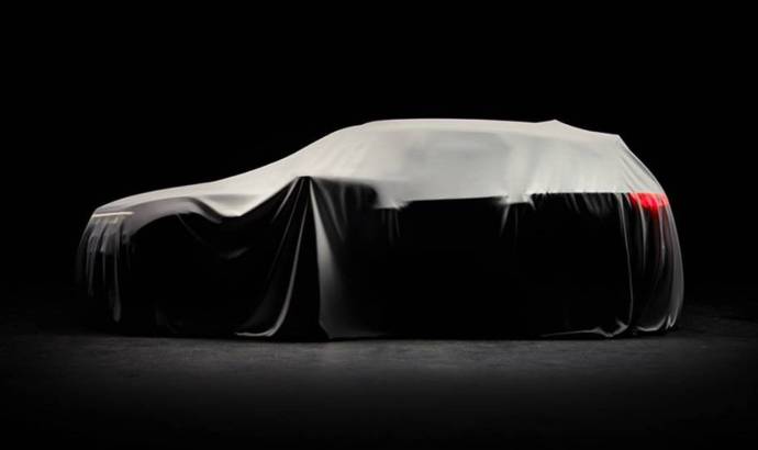 A new teaser picture with the upcoming Volkswagen Touareg - this time it hides under cover